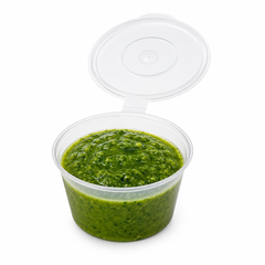 4oz clear hinged condiment pot filled with green pesto sauce, ideal for takeaway sauces and dips.
