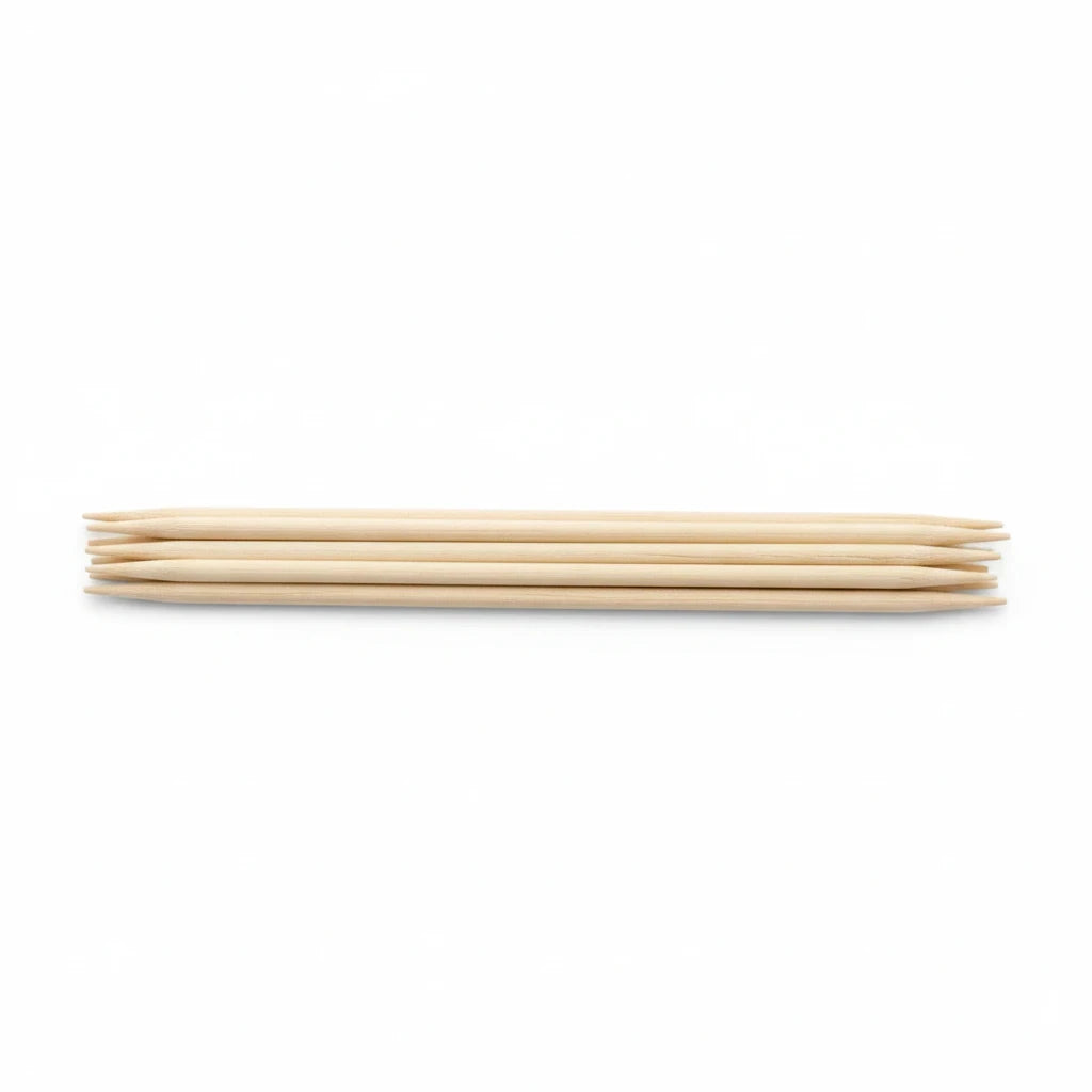 Food Packaging Direct biodegradable birchwood cocktail sticks with double-pointed ends on a white background
