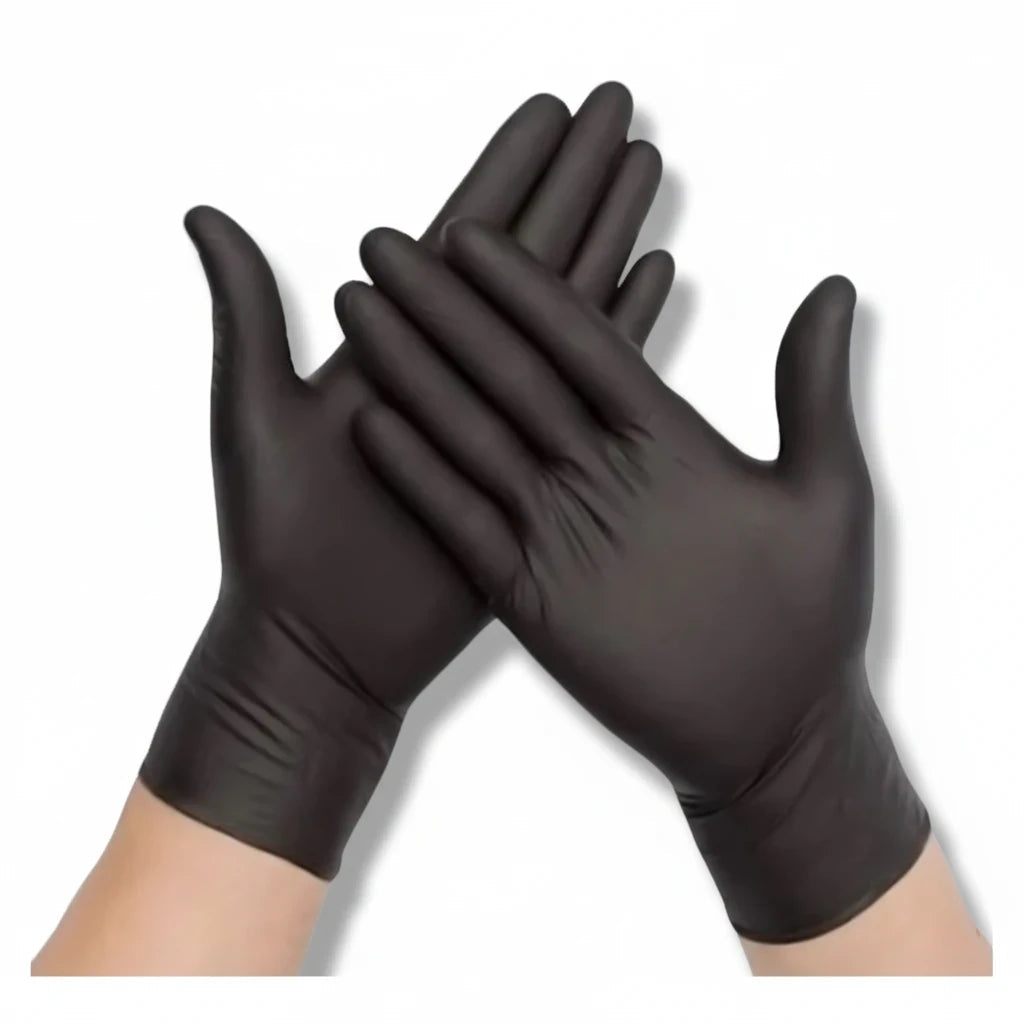 Food Packaging Direct black powder-free nitrile gloves worn on hands, ideal for food handling and safety.
