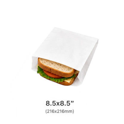Food Packaging Direct white greaseproof paper bags in three sizes holding a croissant and a sandwich