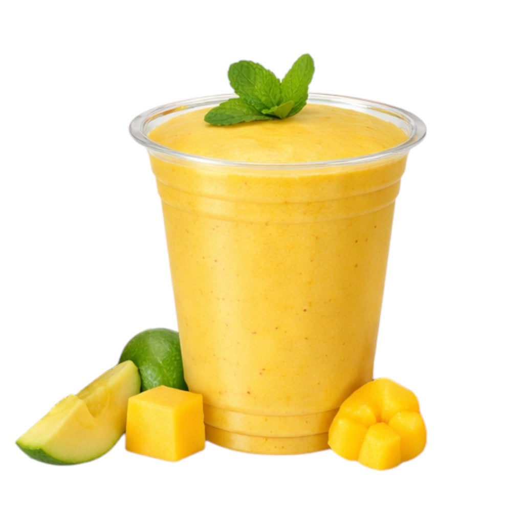 Food Packaging Direct clear rPET smoothie cup filled with yellow mango smoothie, garnished with fresh mint leaves.