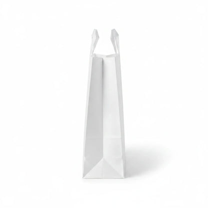Food Packaging Direct white SOS paper carrier bag with flat base and sturdy handles on a plain white background
