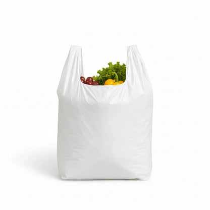Food Packaging Direct white high-density polythene vest carrier bag filled with fresh vegetables and fruit