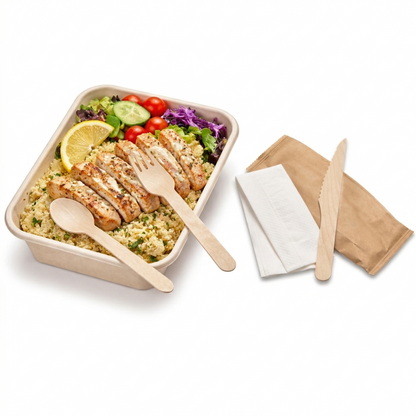 Food Packaging Direct 4-in-1 wooden cutlery set with fork, spoon, knife, and napkin next to a meal in a takeaway box.